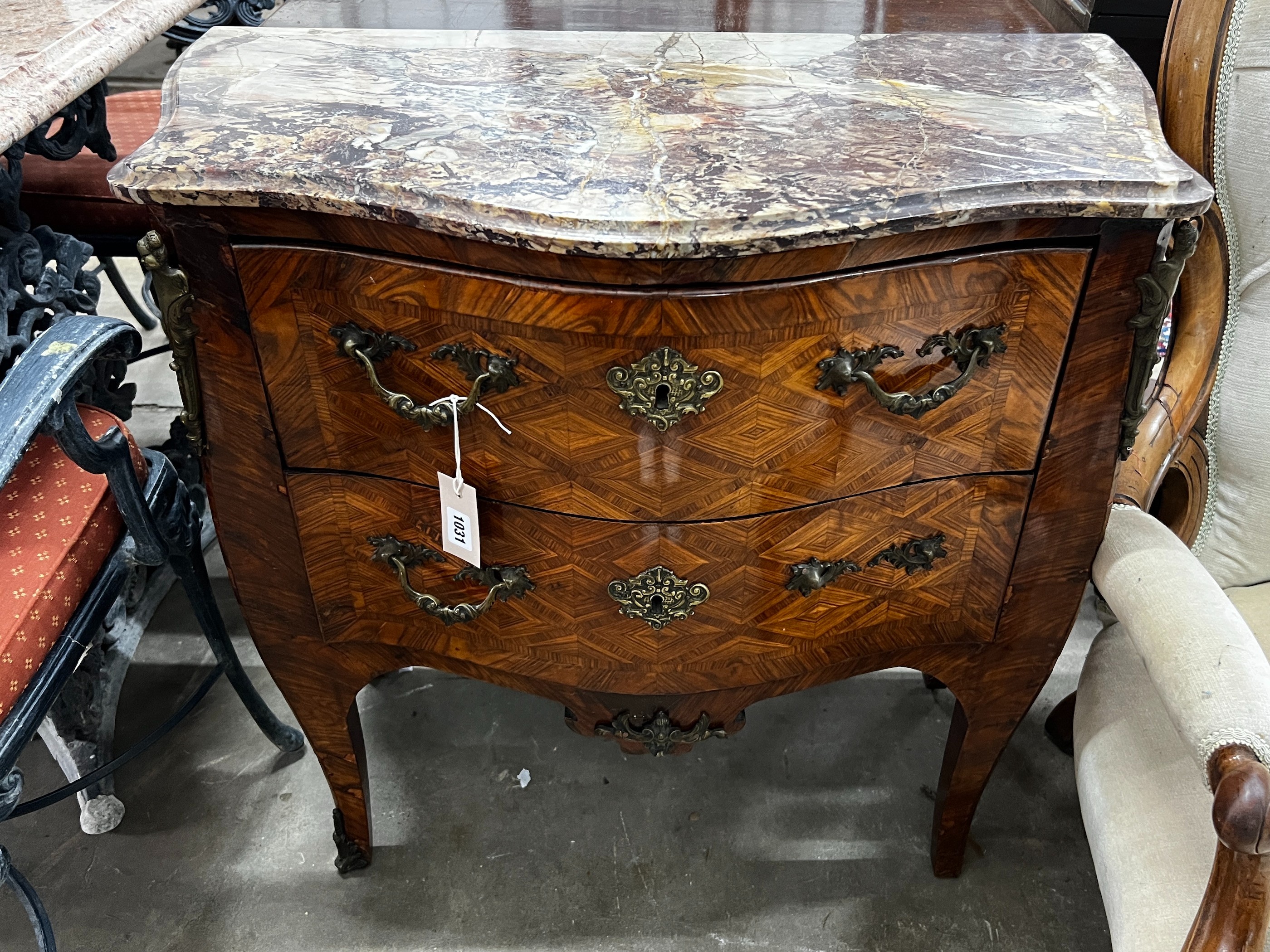 A small 19th century French transitional style gilt metal mounted kingwood marble topped two drawer serpentine commode, width 78cm, depth 39cm, height 75cm